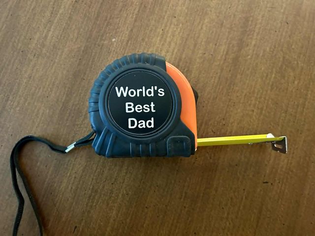 Lot 499-256 - 'World's Best Dad' Tape Measure