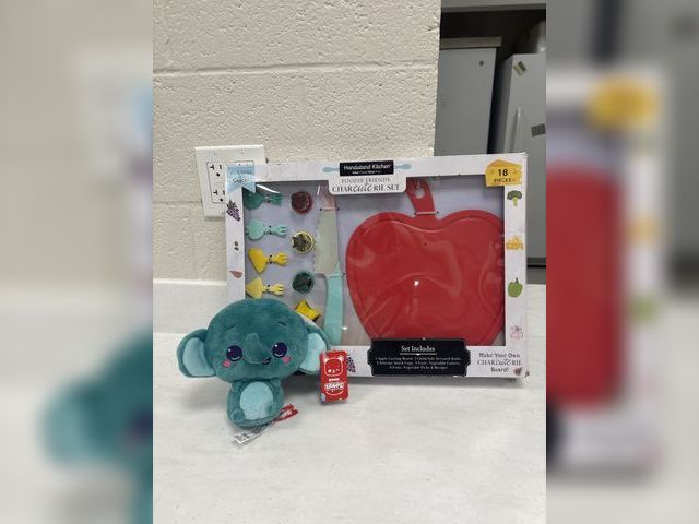 Lot 499-040 - Kids cutting board and cute elephant stuffie