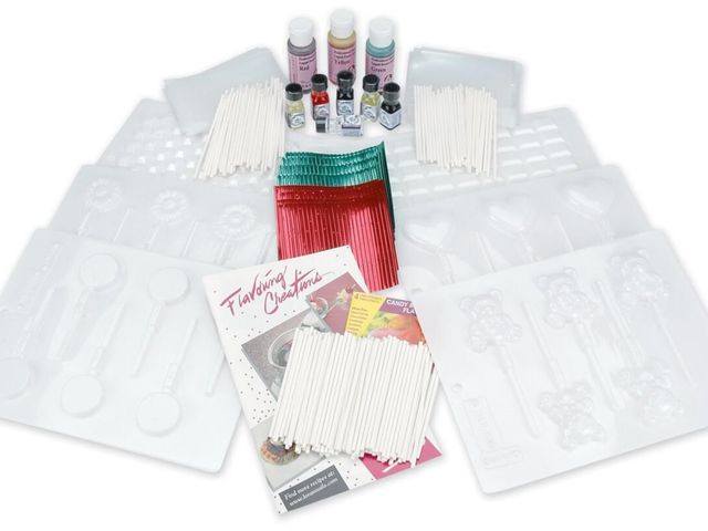 Lot 499-250 - Ultimate Candy Kit -by Lorann Oils 
Kit includes: Heart sheet mold, teddy bear sheet mold, flower sh...