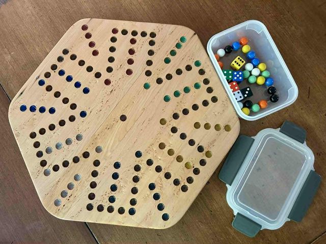 Lot 499-262 - 'Murder, Mayhem' Marble game -Handmade Wooden board by Doug Mingerink
Includes: 15" double-sided woo...