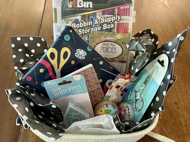 Lot 499-260 - Sewing Basket- 
Includes: Bobbin and Supply Storage box, embroidery scissors and matching tape measu...