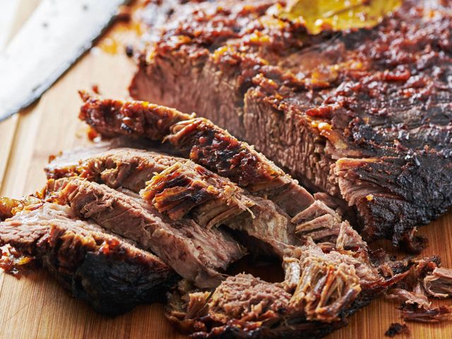Lot 499-215 - Smoked beef brisket dinner for up to 8 people! Enjoy dinner at the Kregal household with a smoked be...