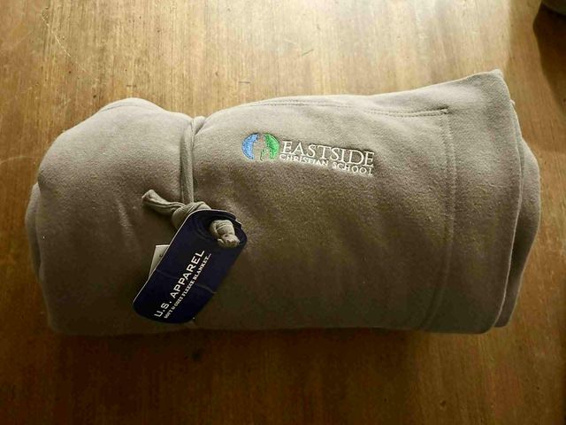 Lot 499-298 - ECS Blanket- Very Cozy! Blanket with Eastside Christian School logo
Color: Fossil; Size: 84x54 in. ;...