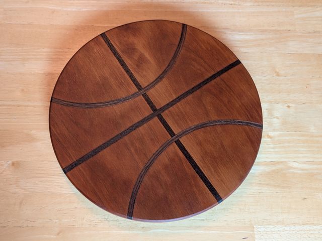 Lot 499-218 - Basketball serving board or cutting board that was handcrafted by Bob Elzinga! This fun piece was ma...