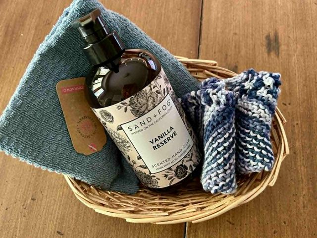 Lot 499-285 - Kitchen Basket- Includes: 2 homemade dishcloths, Kitchen Towel, and Vanilla Reserve Hand Soap 
Thank...