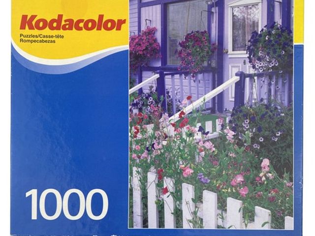 Lot 499-409 - Kodacolor 1000 piece puzzle. Retail is $4.46.