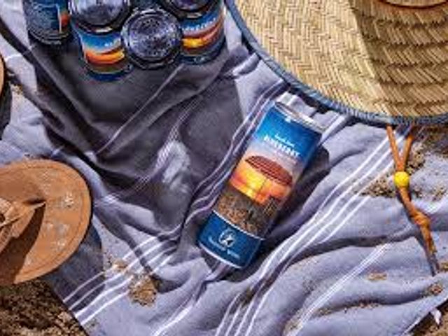 Lot 499-339A - 6 pack of Beach Bum Blueberry sparkling wine from Tanglewood Winery!  Beach Bum Blueberry is a crisp...