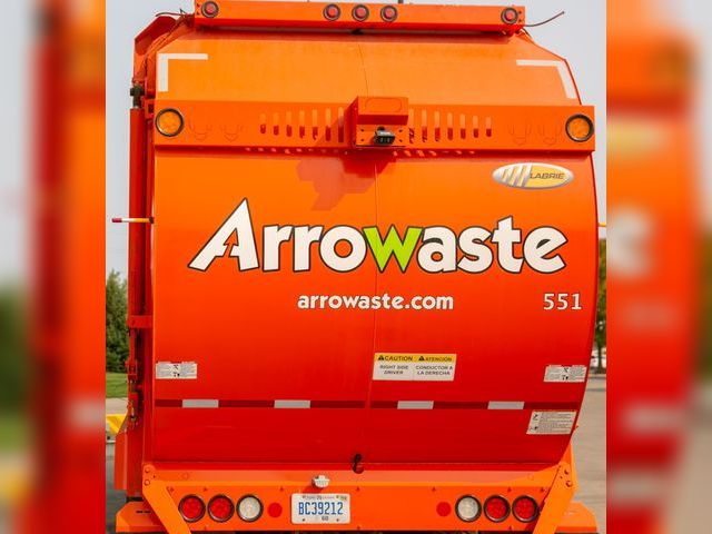 Lot 499-10045 - Gift certificate for one year of free trash service along with a gift basket containing Arrowaste me...