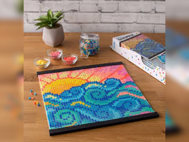 Lot 499-226 - Perler Snappix- 12x12" Snappix kit
2200 beads, Canvas, Hanger Frame, Pattern Sheet with instructions