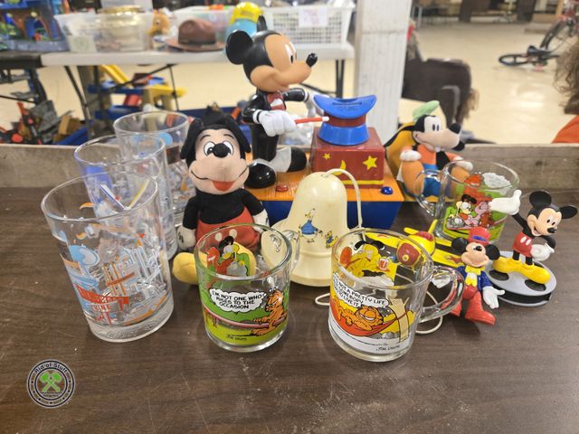 Lot 53-995 - Lot of Disney Mickey Mouse Collectible Items - Vintage MCDonalds Glasses, Metal Airplane and more