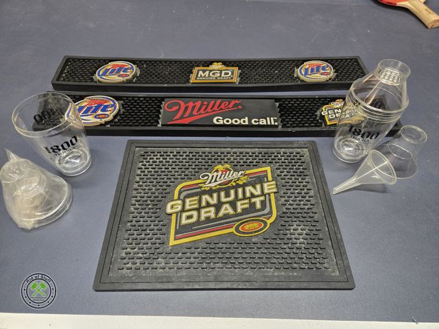 Lot 53-969 - Lot of Rubber Bar Top Mats and Plastic Drink Mixers