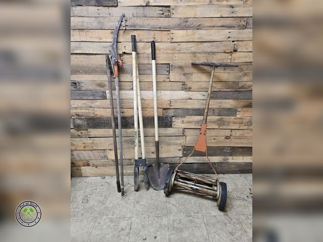 Lot 53-2031 - Hand Grass Cutter Lawn Mower, Post Hole Diggers, Limb Cutter and more yard tools
