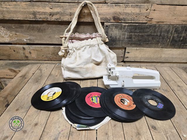 Lot 53-1030 - Sewing Bag with a hand sewing machine with misc Vinyl Records (C15B)