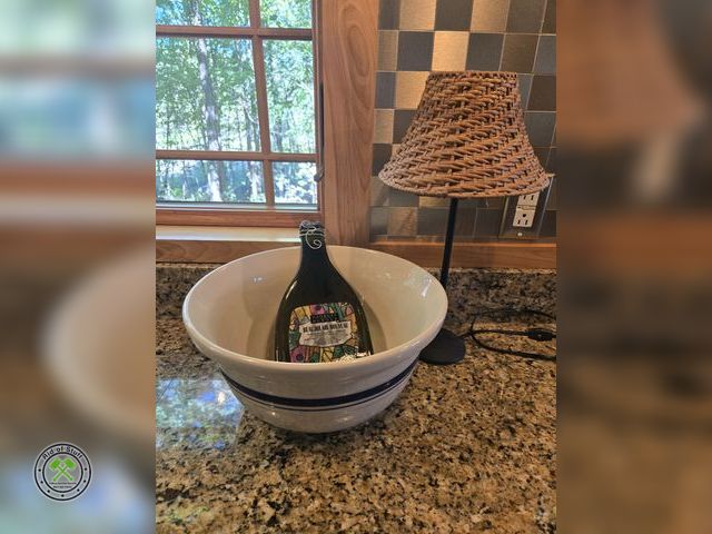 Lot 53-653 - Pflatzgraff Large Bowl - USA with Lamp and Green Glass Bottle wall Decor