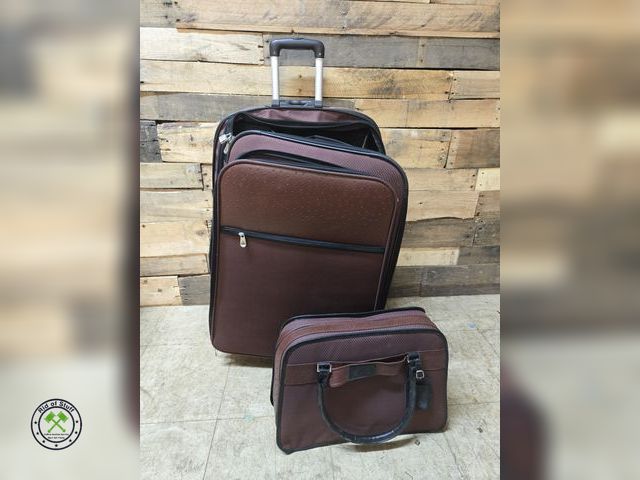 Lot 53-1021 - Large Burgundy Luggage on Wheels with Expandable Handle and Small Matching Bag
