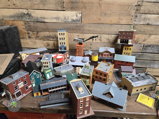 Lot 53-3122 - Large box filled with plastic train town buildings, stores and more (D1B)
