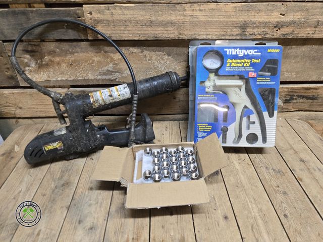 Lot 53-2022 - New Automotive test &amp; Bleed Kit, Battery Operated Grease Gun and New Lug Nuts
