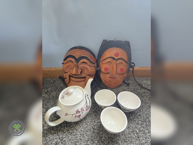 Lot 53-546 - Korean Wooden Hand Sculpted Faces, Man Face jaw moves up and down with Collectible Tea Pot and other...