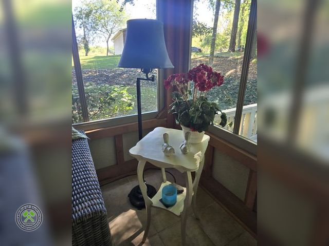 Lot 53-661 - Wooden Accent Table, Lamp, and Table Decor