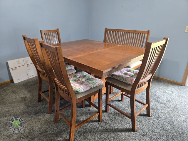 Lot 53-556 - Very nice Dining Room Table with 6 Chairs and a double bench chair 48". Comes with built in leaf. Me...