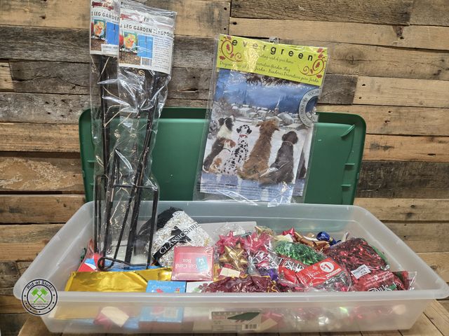 Lot 53-1023 - Sterlite 41qt Plastic Storage Container filled with gift boxes, gift bags, shredded gift paper, 2 ne...