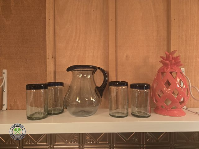 Lot 53-590 - Heavy Duty Glass Pitcher with Matching Glasses and shelf of wine glasses (bring box to load)