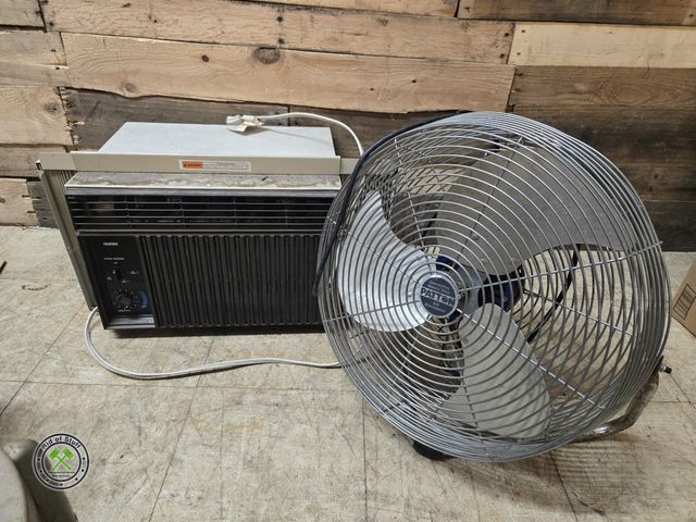 Lot 53-972 - (1) Window Air Conditioner Unit - Plugged in and seems to work with Air Circulator Floor Fan - Works