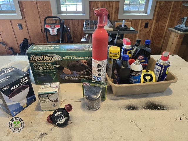 Lot 53-699 - Lot of Misc Oils, Small Engine Oil Vacuum Tool, and more