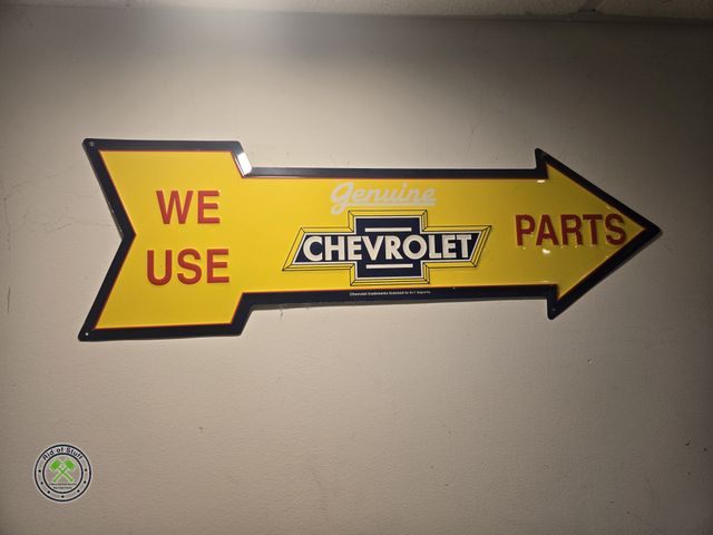 Lot 53-678 - Metal Chevrolet Parts Arrow Wall Sign - 9"x27"