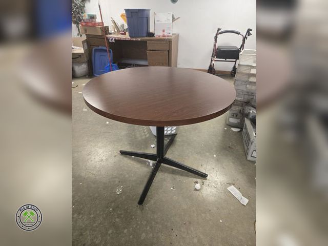 Lot 53-627 - Round Table with metal base - Measures: 36"x29"