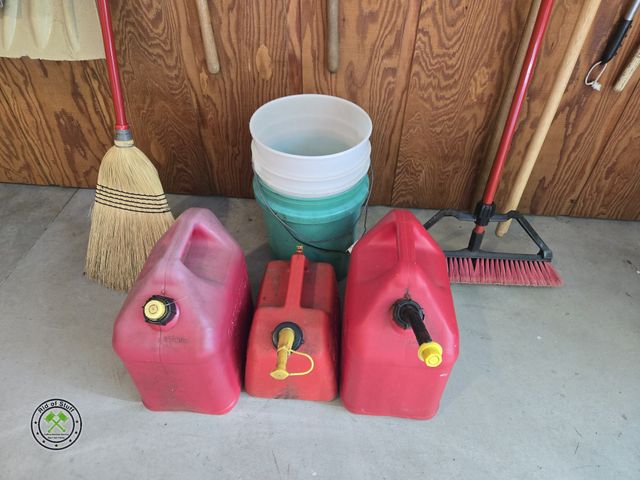 Lot 53-707 - 3 Plastic Gas Cans, Push Broom and Regular Broom
