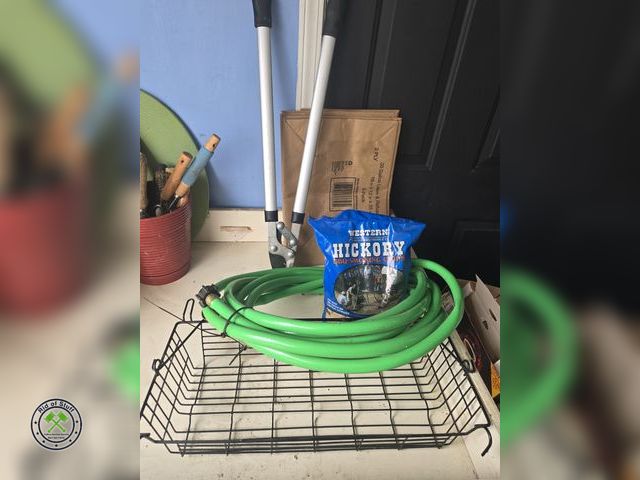 Lot 53-621 - Garden Hose, Plant Shears, Lawn Bags, new bag of Hickory Smoking Chips and more