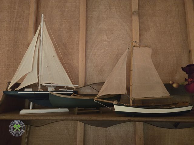 Lot 53-612 - Lot of Wooden Sailboats and Wooden Canoe Decor