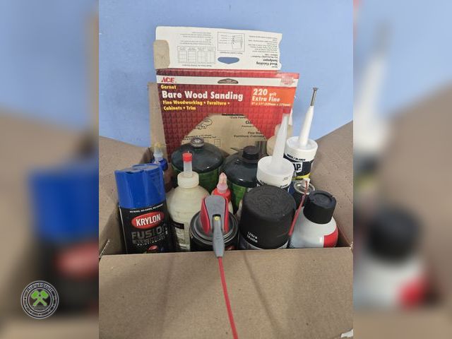 Lot 53-613 - Box full of misc chemicals, Coleman Propane Tanks, Spray Paints and more