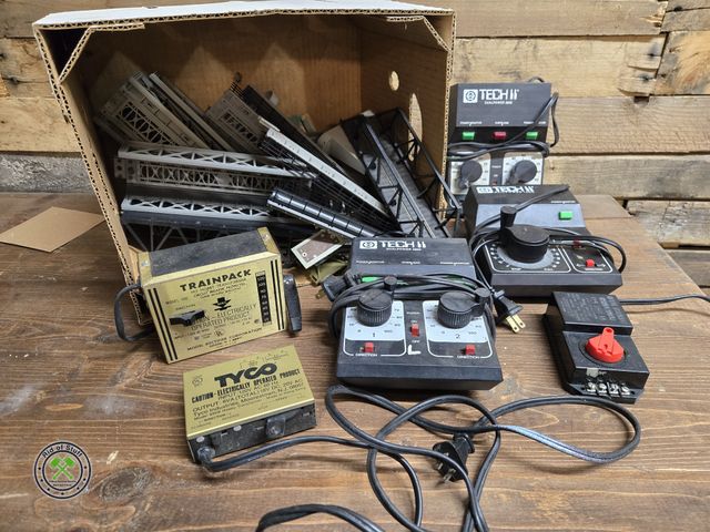 Lot 53-3124 - Lot of Train Tracks, Tyco Train Transformers, Tech II Dual Transformers and more (D1B)