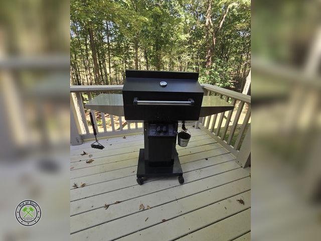 Lot 53-668 - Phoenix Gas Grill with Partial Propane filled tank and empty Tank. In working condition. Comes with ...