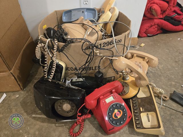 Lot 53-682 - Large box filled with vintage Telephones and telephone accessories (BSMT)