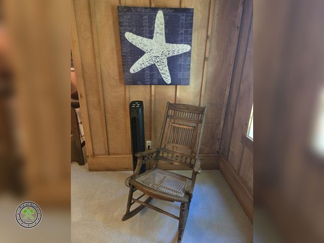 Lot 53-599 - Antique Wooden Rocking Chair - Excellent Condition with Canvas Starfish Wall Decor and working elect...