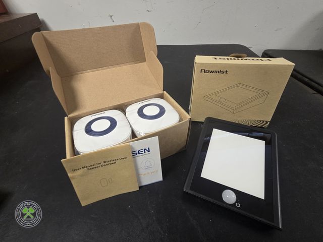 Lot 53-657 - New Solar Powered Motion Sensor Light and New Wireless Door Bell Sensors (BSMT)