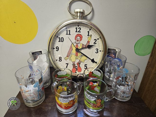 Lot 53-717 - Vintage Awesome McDonalds Battery Operated Clock, Misc McDonalds Glasses (Mickey/Disney and Garfield...