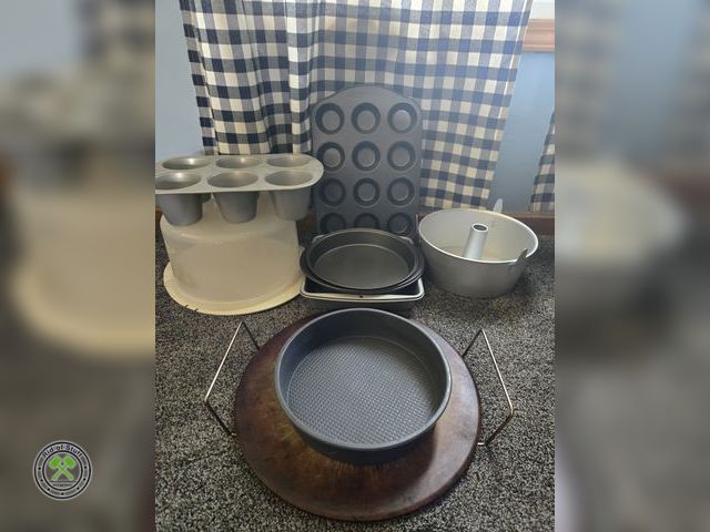 Lot 53-544 - Pizza Stone, Baking Pans/Cupcake Pans, Tupperware Container and more