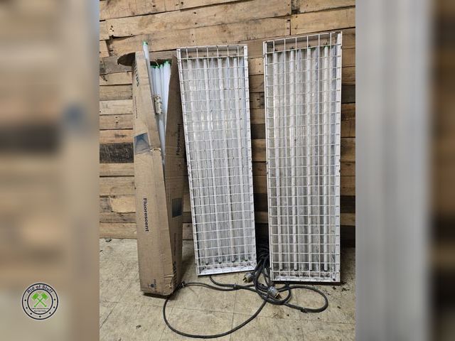 Lot 53-2030 - (2) 4'x8' Metal Garage Lights and box of fluorescent bulbs (bulbs to do not fit these lamps) - Both ...