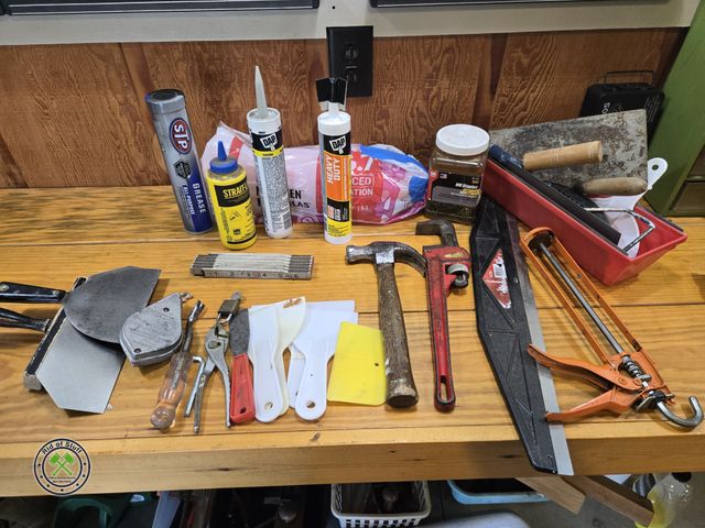 Lot 53-698 - Lot of Misc Tools - Chalk Line with Chalk, Putty Knives, Caulk, Caulk Gun and more
