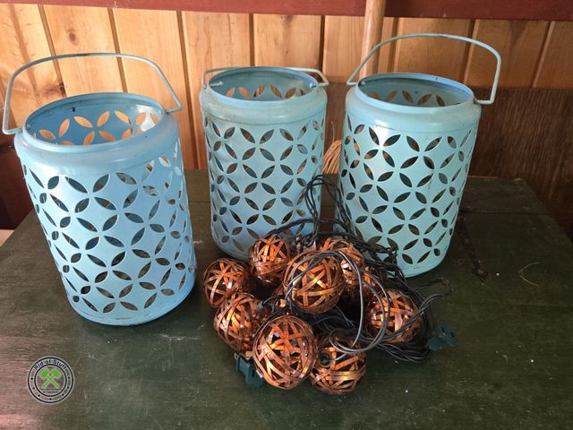 Lot 53-743 - null (3) Metal Teal Colored Outdoor Hanging Lanterns and strand of gold colored hanging lights