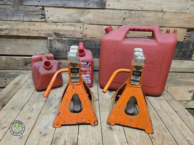 Lot 53-821 - Winner Series Heavy Duty 2 Ton Vehicle Jack Stands with 3 Plastic Gas Cans (D2T)