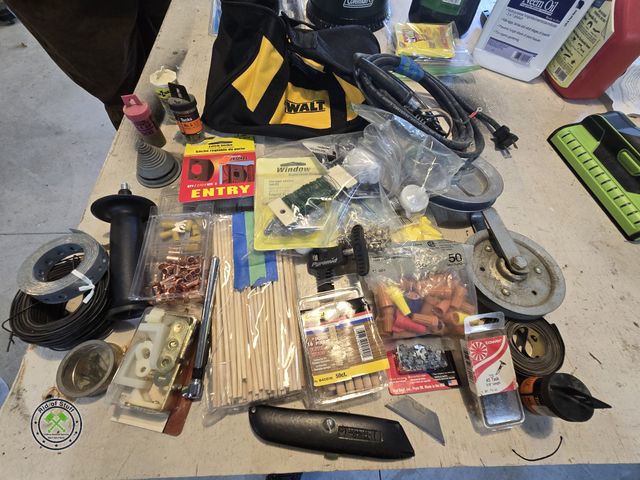 Lot 53-686 - Dewalt Tool Bag filled with misc hardware, electrical pieces, soldering wire, and tons more useful i...