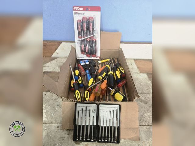 Lot 53-563 - Tons and tons of screwdrivers. Never look for another again! New package of drivers