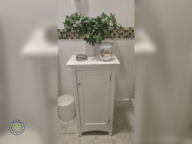 Lot 53-514 - White Bathroom Cabinet - Measures: 15"x14"x30" with Decor on Top- Contents inside cabinet - not incl...