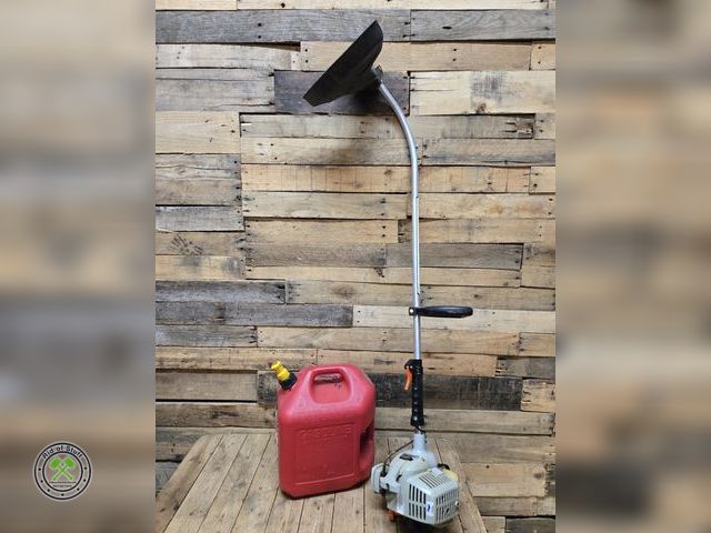 Lot 53-817 - Echo Gas Powered Weed Whip with 5 Gallon Gas Can - Weed Whip has compression, no further testing was...