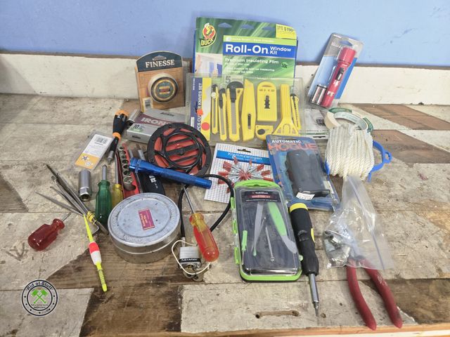 Lot 53-565 - Lot of garage misc. Includes: New Pack of Box cutters, Frost Guard Window, Flashlight, Loud High Pit...